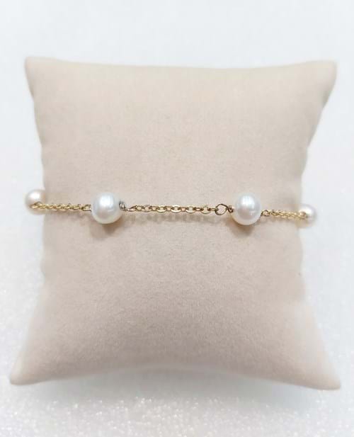 Bracciale in oro giallo con perle naturali